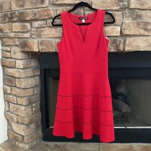 NWT red sleeveless dress. Eyelet design on the bottom. V neck. Size 6